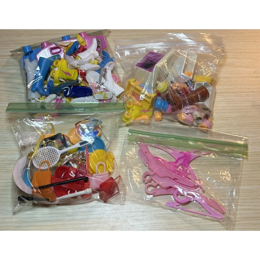 Vintage 80s Barbie lot Including Clothes, Accessories And A Case